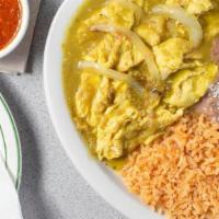Huevos En Salsa Verde Combo · scrambled eggs mixed with our famous salsa verde and grill onion served with rice, refried b...