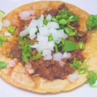 Chorizo Taco · Spicy mexican pork chorizo on a corn tortilla; served with cilantro, onion, lime, and hot sa...