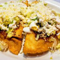 Two Fried Quesadillas · Homemade fried quesadillas. Made from corn tortillas filled with choice of cheese, chicken, ...