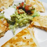 Quesadilla Harina · Choose chicken or steak, made with flour tortilla, cheese, along with a side of lettuce, sou...