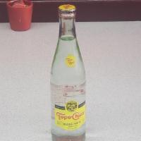 Topo Chico · Mineral water in a glass bottle.  (requires bottle opener)