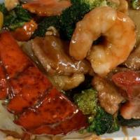 Happy Family · Lobster, jumbo shrimp, chicken, pork, and beef with mixed vegetables in house special brown ...