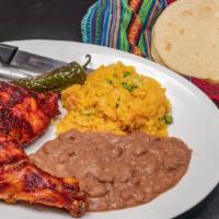 Pollo Asado / Grilled Chicken · Arroz y frijoles. / Rice and beans.