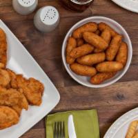 Southern Chicken Tenders Family Meal · Includes Cole Slaw, Hush Puppies & Retro Crinkle Cut Fries