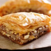 Baklava · Classic Greek pastry made with layers of phyllo, honey & nuts