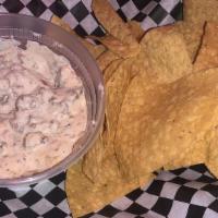 M Dip · A warm combination of cream cheese diced onions and seasoned ground chuck