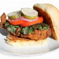 Fried Chicken Sandwich · Our marinated chicken breast double breaded in Panko and fried crispy with a fresh griddled ...