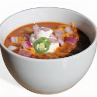 Housemade Chili · Whole tomatoes cooked down with onions, peppers, garlic, jalapenos with fresh ground beef an...