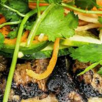 Grilled Pork / Thit Nuong Banh Mi · Char-grilled lemongrass pork. Served on Golden Bakery bread dressed with pickled carrots, da...