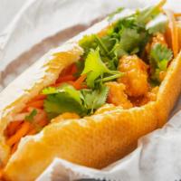 Bang Bang Shrimp Banh Mi · Spicy. Fried Gulf shrimp tossed in a sweet thai chili glaze. Served on Dong Phuong bread dre...