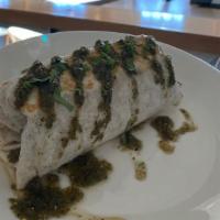 Carne Asada Burrito · bottom sirloin carne asada, sauteed peppers and onions, jack cheeses, pico de gallo, rice, b...