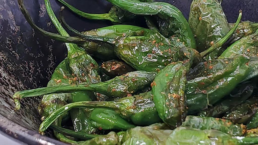Shishito Peppers · Vegan, spicy, vegetarian. Deep fried shishito peppers with sweet soy and togarashi (Japanese seven-spice peppers).