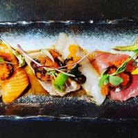 Rainbow Crudo · Bluefin tuna, Salmon, white fish, yellowtail, shrimp, albacore, served with ponzu, kaiware &...