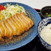 Tonkatsu  · Panko-fried protein of your choice, cabbage, corn, red pickled ginger, served with Japanese ...