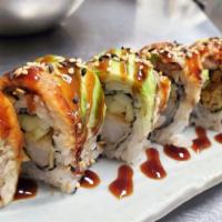 Dragon Roll · Tempura shrimp and cucumber; topped with avocado and eel, eel sauce and sesame seeds.