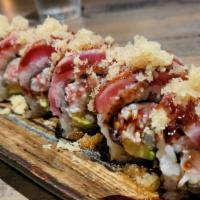 Aki Roll · Tempura shrimp, cucumber, crunches and crab salad inside, topped with seared tuna, eel sauce...