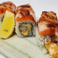 Matsu · Tempura shrimps, crab salad, cucumber, topped with torched salmon, lemon slices and eel sauce