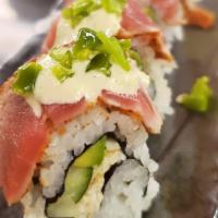 Kimuri · Crab salad, avocado, cucumber; topped with seared tuna, wasabi mayo & jalapeno relish