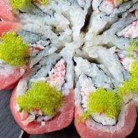 Sakura · Flower-shaped roll with tuna, crab salad, cucumber and tobiko.