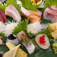 Deluxe Sashimi Set (15 Pieces) · Bluefin tuna, yellowtail, salmon, white fish, mackerel, octopus, squid, tamago, scallops, se...
