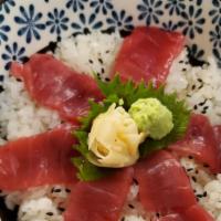 Tekka Don · Six pieces of bluefin tuna, kizami nori over sushi rice.