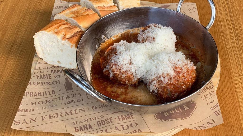 Meatballs · Pork and ground beef meatballs, Manchego cheese, tomato sauce