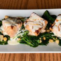 Salmon (5 Oz) · Baby spinach, chickpeas, lemon cream