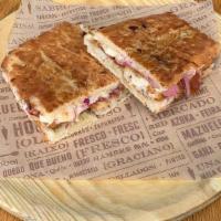 Croqueta Sandwich · Serrano ham croquettes, sliced Serrano ham, Mozzarella, pickled onions, Dijon mustard aioli,...
