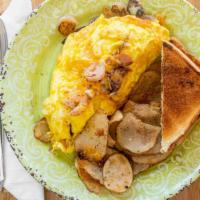Cajun Omelet · Shrimp, andouille sausage, spiced onions, and cheese.