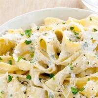 Fettuccine Alfredo · Fettuccine pasta marinated with creamy homemade Alfredo sauce with one type of the following...