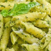 Penne Pesto · Penne noodles mixed with our delicious homemade pesto sauce topped with mozzarella cheese.