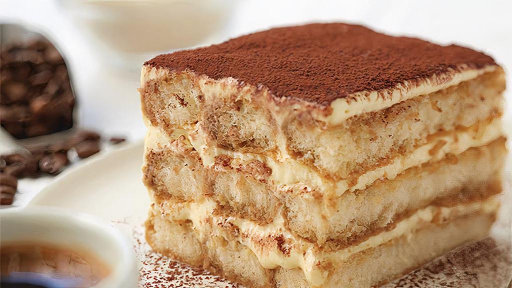 Tiramisu · 2 delicate layers of sponge cake saturated with espresso coffee and marsala, then combined with a thick creamy layer of filling and mascarpone.