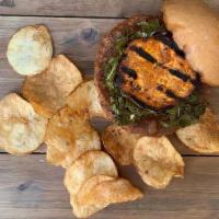 Black Eye Pea Burger · Black Eyed Pea patty topped with a oven roasted sweet potato slice, pickled collard greens, ...