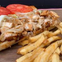 Chicken Philly · Free-range chicken breast chopped and topped with grilled onions, pepper jack cheese, shredd...