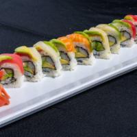 Rainbow Roll* · Imitation crab mix, avocado, cucumber, masago*. Top with Assorted Raw fish*, shrimp and avoc...