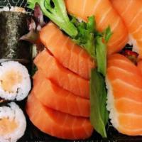 Salmon Lover · Four pieces tuna sushi, three pieces of sashimi, and one salmon roll.