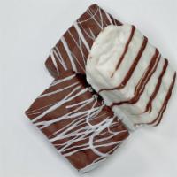 Chocolate Covered Rice Crispy Treats (2 Pcs) · America's favorite treat dipped in our milk or white chocolate with a topping of your choice