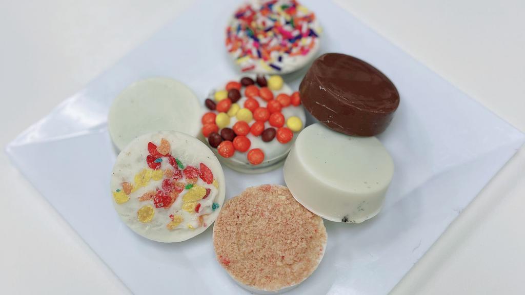 Chocolate Covered Oreos (2 Pcs) · America's favorite cookie dipped in our milk or white chocolate.