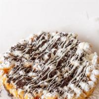 Cookies & Cream Funnel Cake · Your favorite fair food with a sprinkle of powdered sugar. This funnel cake is topped with c...