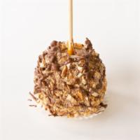 Snicker Apple · A classic granny smith apple dipped in our signature caramel sauce and dipped again in tiger...