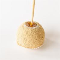 Cheesecake Apple · A classic granny smith apple dipped in our signature caramel sauce and dipped again in  whit...