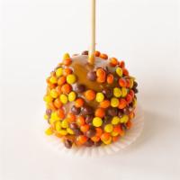 Reese'S Apple · A classic granny smith apple dipped in caramel sauce, rolled in mini Reese's pieces