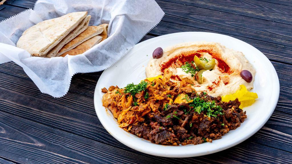 Hummus With Shawarma · Your choice of shaved seasoned beef and lamb, chicken or mixed.