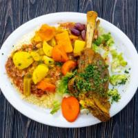 Couscous Platter · Couscous served with chicken, beef & lamb or mixed shawarma.