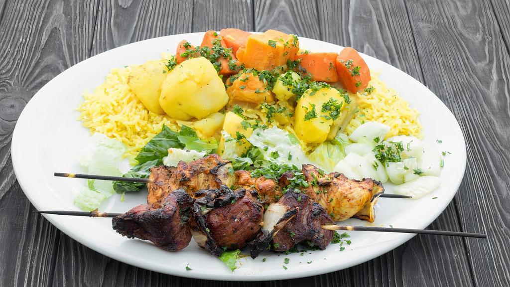 Mix Kabob · Two kabobs (1 chicken and 1 lamb). Served with rice and vegetables.