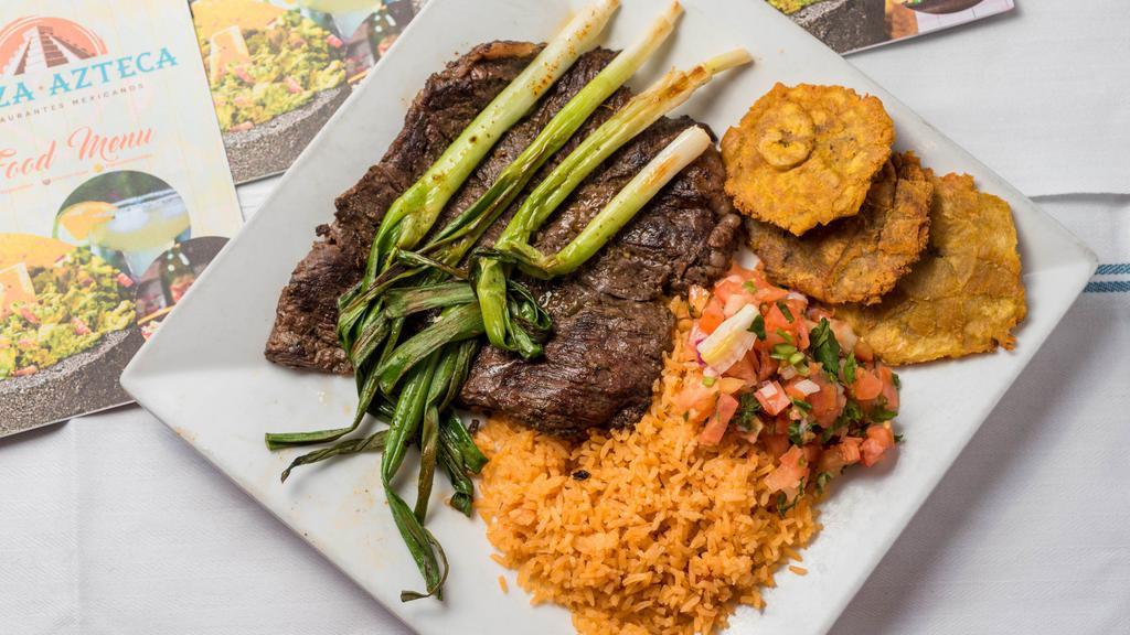 Churrasco Steak · Starting at 1520 cal) Grilled Ribeye steak topped with grilled onions. Served with a side of  tostones, pico de gallo and rice