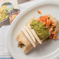 Burrito Vegano · New. One fouteen inch vegan tortilla filled with soy meat, black beans, white rice, mushroom...