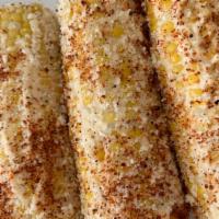 Mexican Street Corn · Corn on the cob 
Mayo, Queso Cotija and chile powder