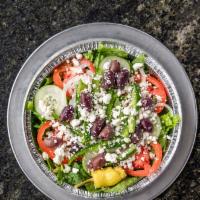 Greek Salad · Lettuce, tomatoes, cucumbers, onions, green peppers, kalamata olives, feta cheese, and peppe...