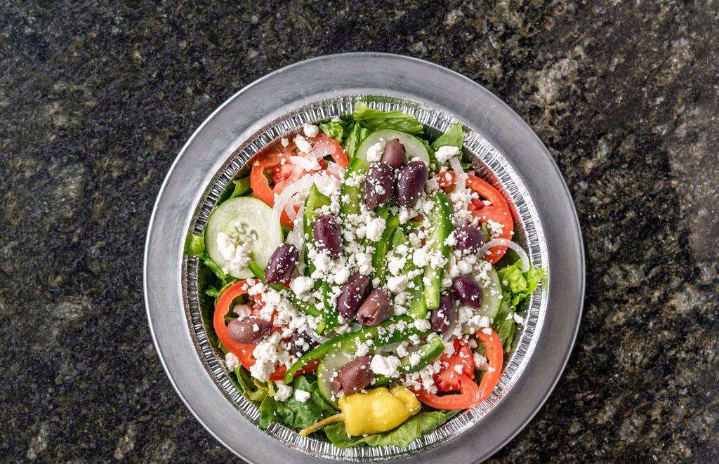 Greek Salad · Lettuce, tomatoes, cucumbers, onions, green peppers, kalamata olives, feta cheese, and pepperoncini.
